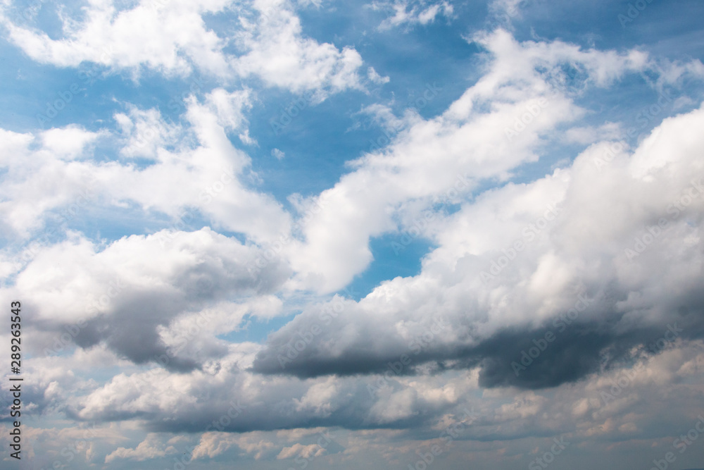 white clouds in bright blue sky white clouds in bright blue sky