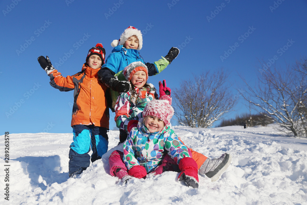 kids in winter time - obrazy, fototapety, plakaty 