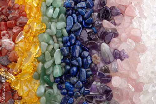 Print op canvas Healing Chakra Crystals Banner - Chakra colored tumbled healing stones