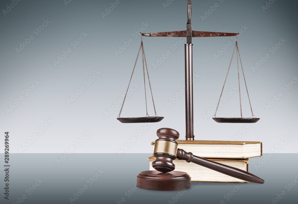 Justice Scales and books and wooden gavel on table. Justice concept Justice Scales and books and wooden gavel on table. Justice concept