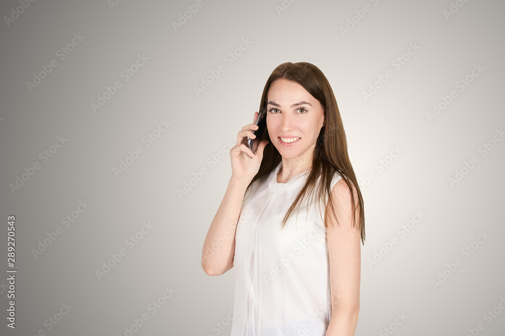 Young girl with mobilephone. Business woman talking on phone. Adorable caucasian businesswoman shopping Young girl with mobilephone. Business woman talking on phone. Adorable caucasian businesswoman shopping