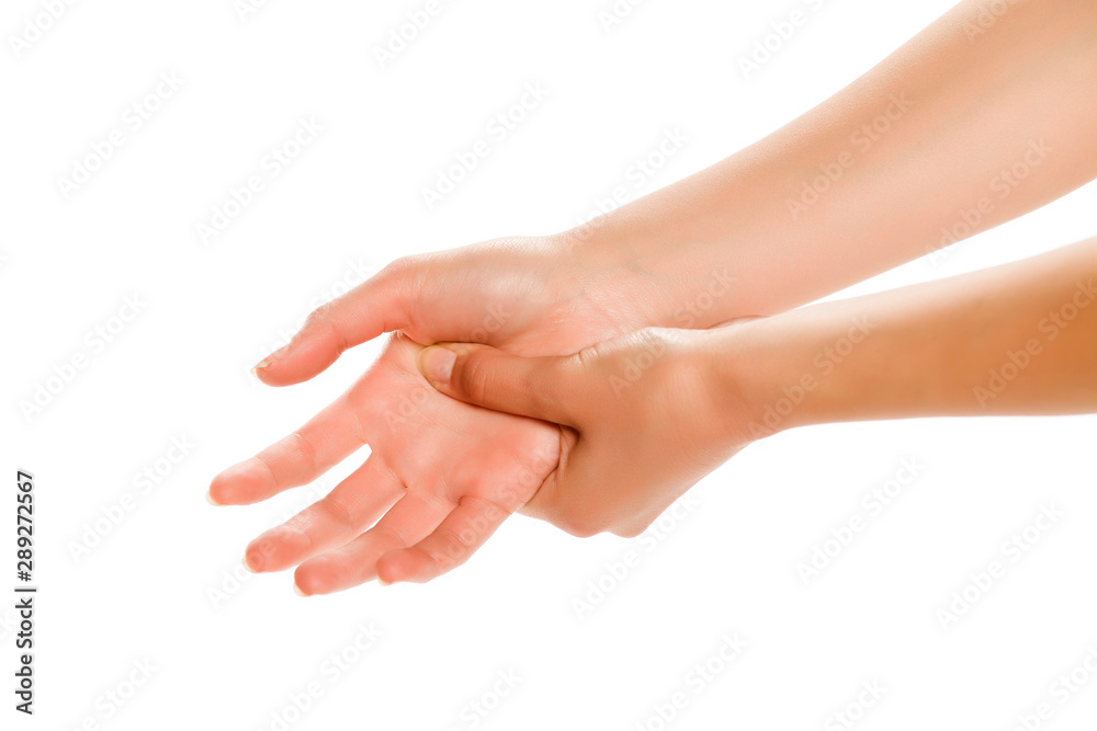 Woman massaging her hands, isolated on white background