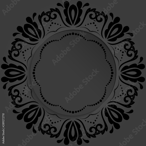 Round frame with floral elements and arabesques. Dark pattern with arabesques