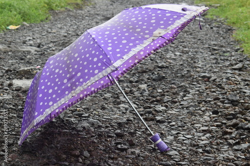 Ladies umbrella in the clear water 