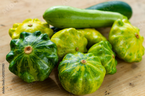 group of different varieties of squash zucchini