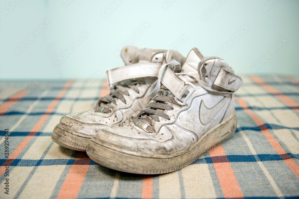 Pavia, Italy - August 17, 2016: Old and dirty pair of Nike Air Force One  shoes - illustrative editorial Stock Photo | Adobe Stock
