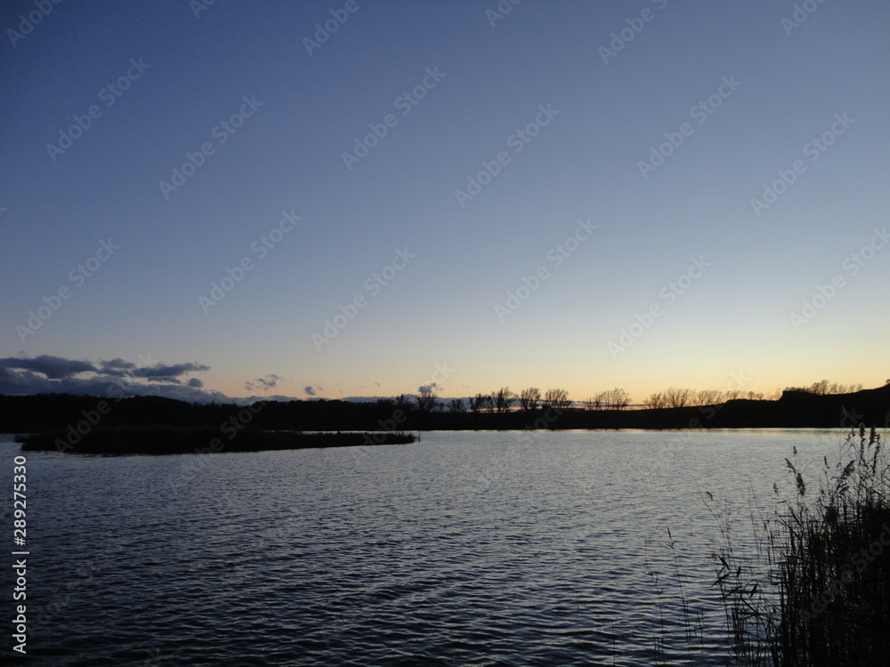 Fototapeta premium sunset over lake