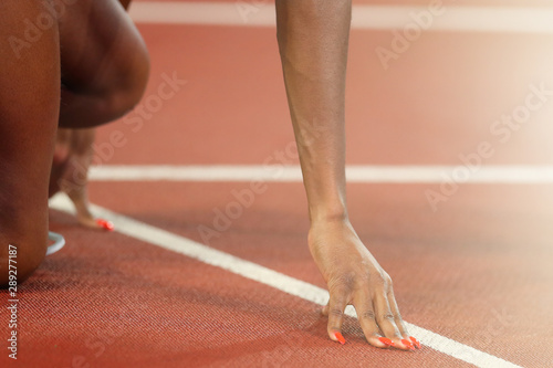 Close - up of the girl's hands before the start of the race