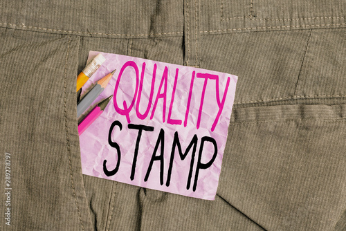 Conceptual hand writing showing Quality Stamp. Concept meaning Seal of Approval Good Impression Qualified Passed Inspection Writing equipment and purple note paper inside pocket of trousers