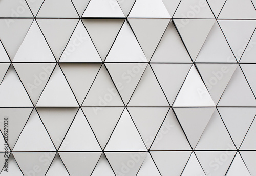 Silver geometric wall background with triangles.