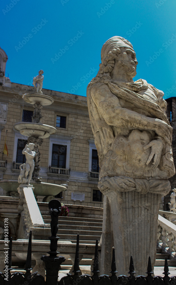 Palermo, Italy - May 25 2013: Piazza Pretoria Square Statues