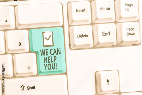 Handwriting text writing We Can Help You. Conceptual photo offering good assistance to customers or friends White pc keyboard with empty note paper above white background key copy space
