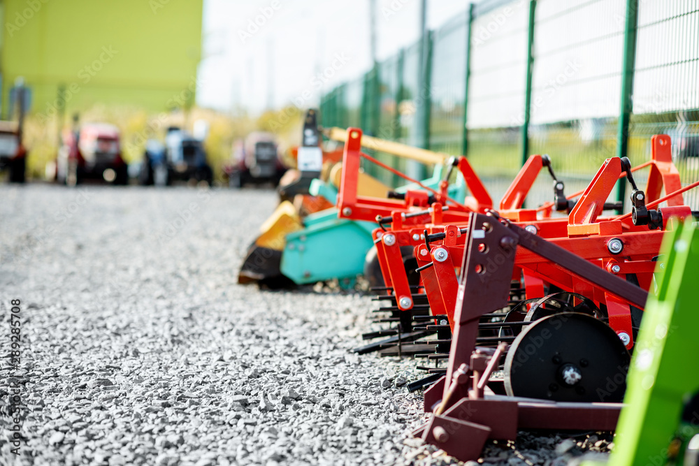 New plows for farming on the open ground of agricultural shop