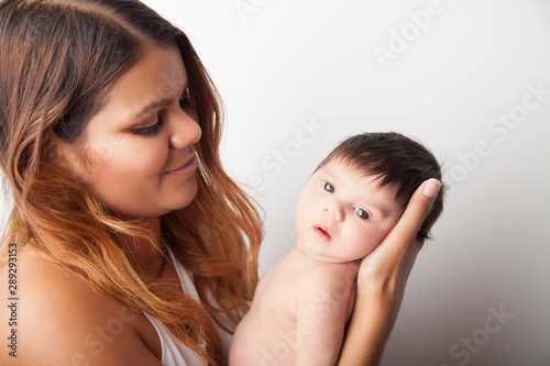 New Australian mum looking at her lovely newborn baby © Hope