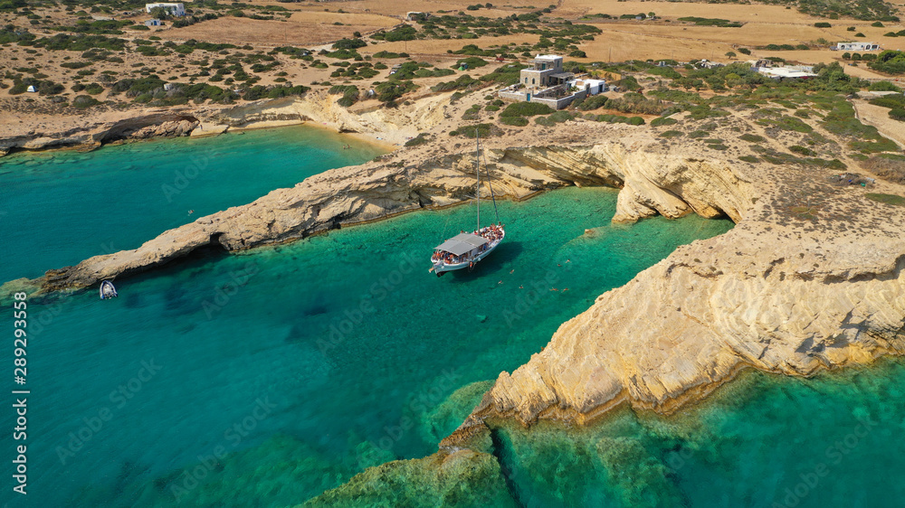 Aerial drone photo of Laki paradise beach with beautiful emerald and turquoise sea and small volcanic bays, Kato Koufonisi, Small Cyclades, Greece
