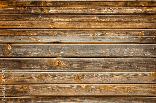 old wooden planks with a brown background