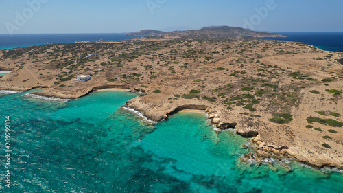 Aerial drone photo of turquoise paradise beaches of Kato Koufonisi island main Chora and church of Panagia, Small Cyclades, Greece