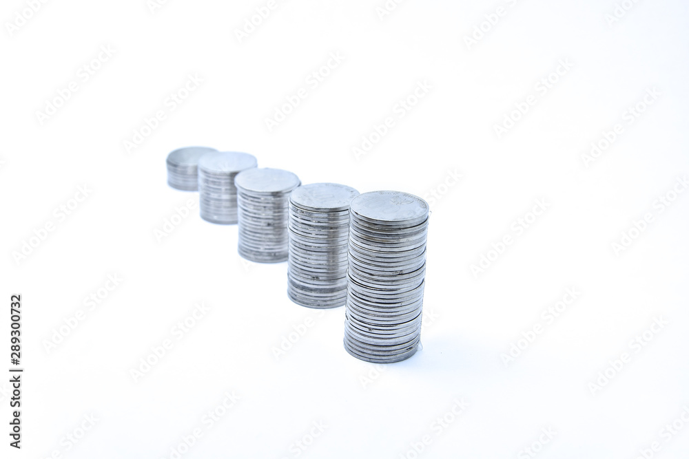 pile of silver coins stack and growing money graph on rows, isolated on white background with clip path. Income, profits, finance, Investment, Interest and Saving money concept, indonesia rupiah., pile of silver coins stack and growing money graph on rows, isolated on white background with clip path. Income, profits, finance, Investment, Interest and Saving money concept, indonesia rupiah.,