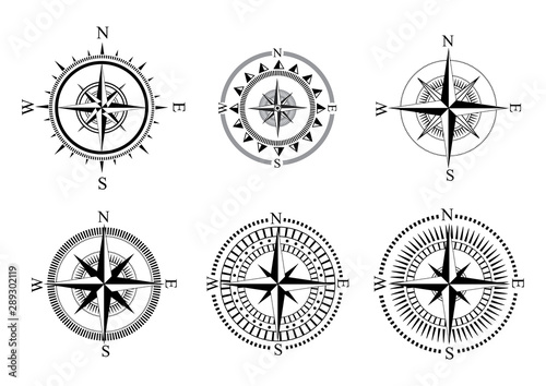 Collection of logos of the compass. Stylized sea compasses with a wind rose. Measuring device. Black and white vector logo. Tattoo.