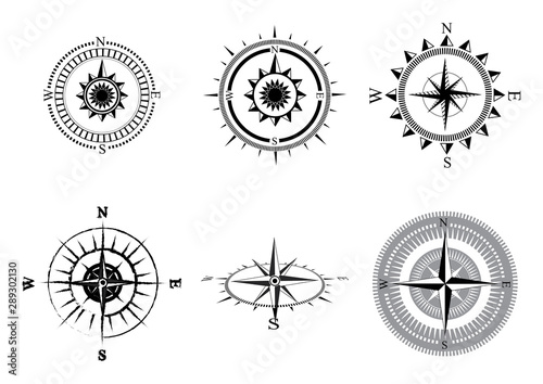 Collection of logos of the compass. Stylized sea compasses with a wind rose. Measuring device. Black and white vector logo. Tattoo.