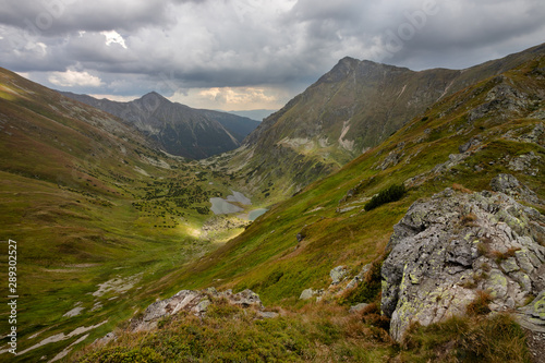 Storm clouds in west Tatra Mountains with view on Raczkowe lake and Jakubina photo