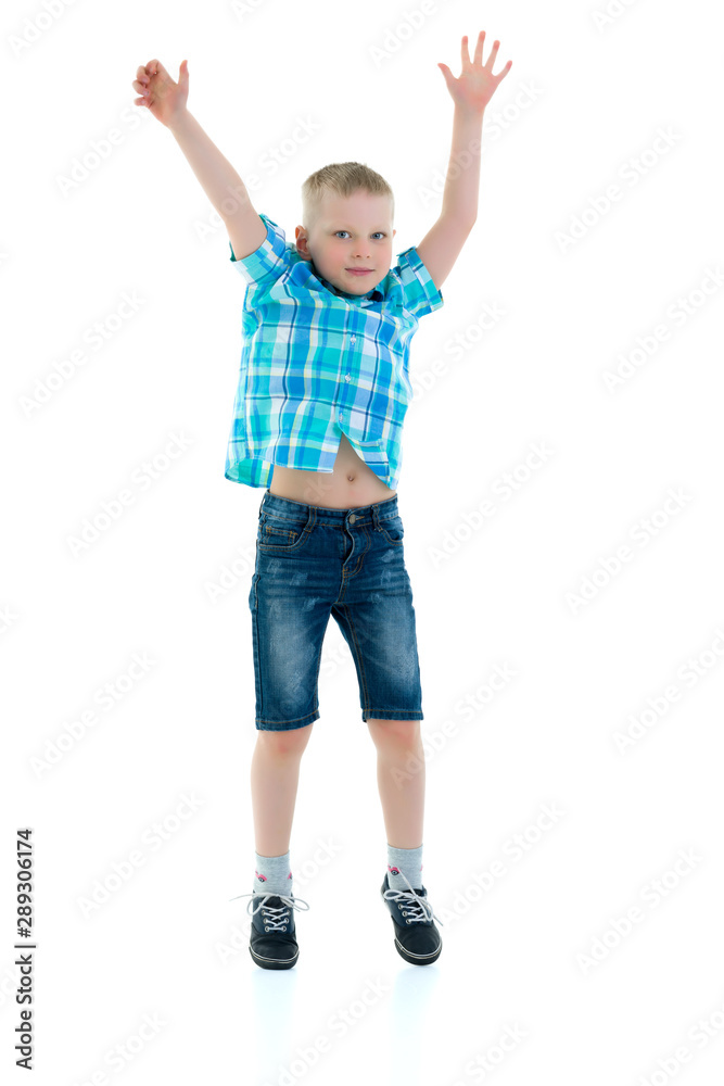 Little boy jumping.The concept of a happy childhood, sports and Little boy jumping.The concept of a happy childhood, sports and