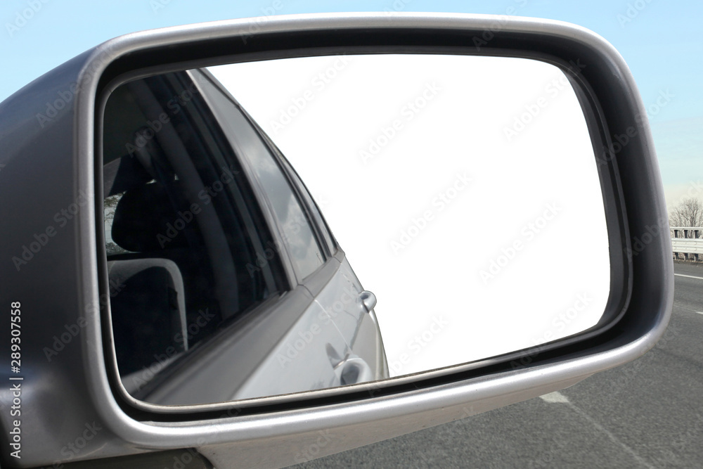 close up on a rear external car rear mirror with clipping path