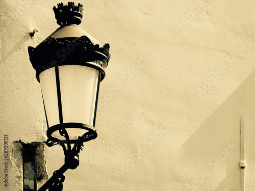 old street lamp on wall