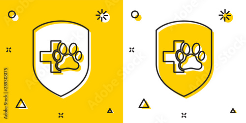 Black Animal health insurance icon isolated on yellow and white background. Pet protection icon. Dog or cat paw print. Random dynamic shapes. Vector Illustration