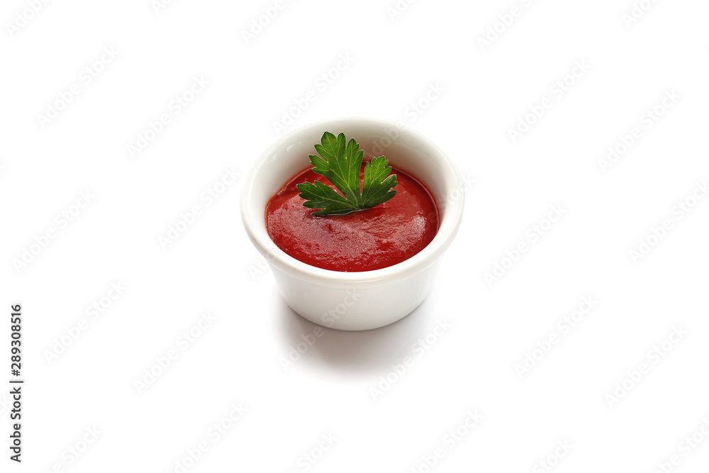 Ketchup on a white background. Tomato sauce in a bowl Ketchup on a white background. Tomato sauce in a bowl