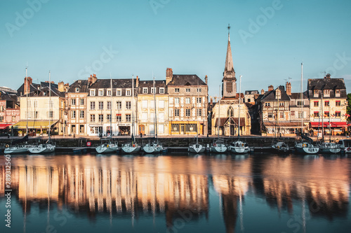 HONFLEUR, FRANCE - MAY4, 2018:Waterfront reflection of traditional houses in Honfleur, Normandy, France