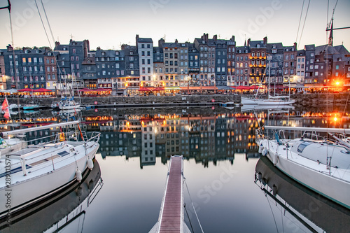 HONFLEUR, FRANCE - MAY4, 2018:Waterfront reflection of traditional houses in Honfleur, Normandy, France