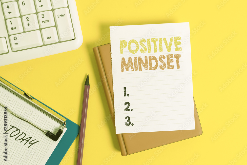 Writing note showing Positive Mindset. Business concept for mental attitude in wich you expect favorable results Pile of empty papers with copy space on the table Writing note showing Positive Mindset. Business concept for mental attitude in wich you expect favorable results Pile of empty papers with copy space on the table