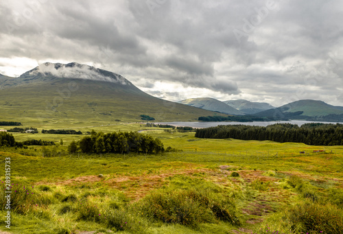 Cloudy Scottish highlands landscape. Photo taken half-way from Glasgow to Fort William  in the August of 2019.