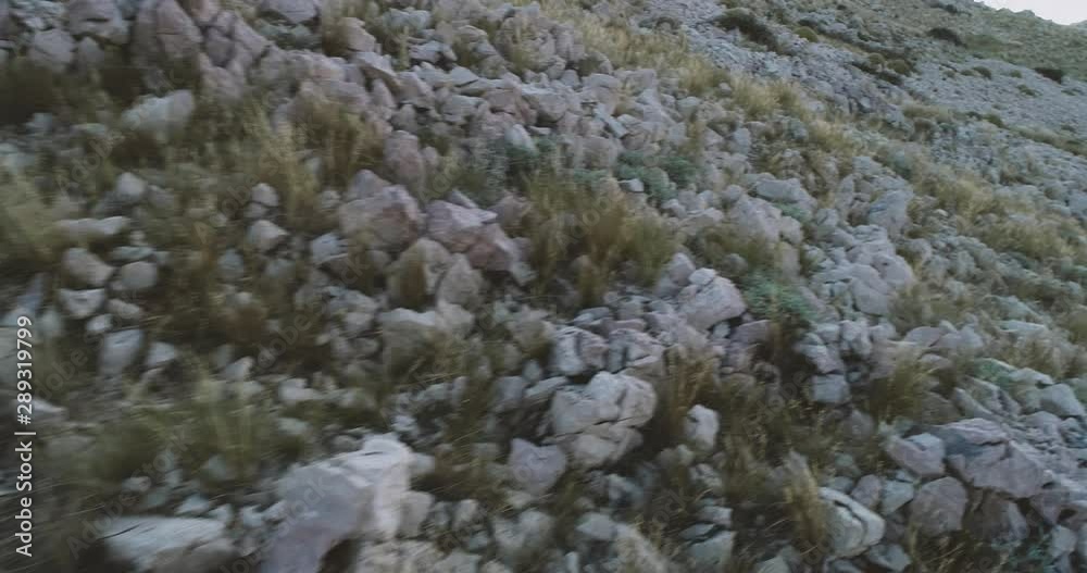 Aerial Drone flight in summer over mountains on the island krk near baska in croatia during sunrise over the sea Aerial Drone flight in summer over mountains on the island krk near baska in croatia during sunrise over the sea
