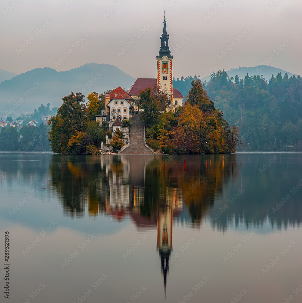 Lake Bled and the Church island of the assumption of Mary. Amazing autumn colors, stunning lights