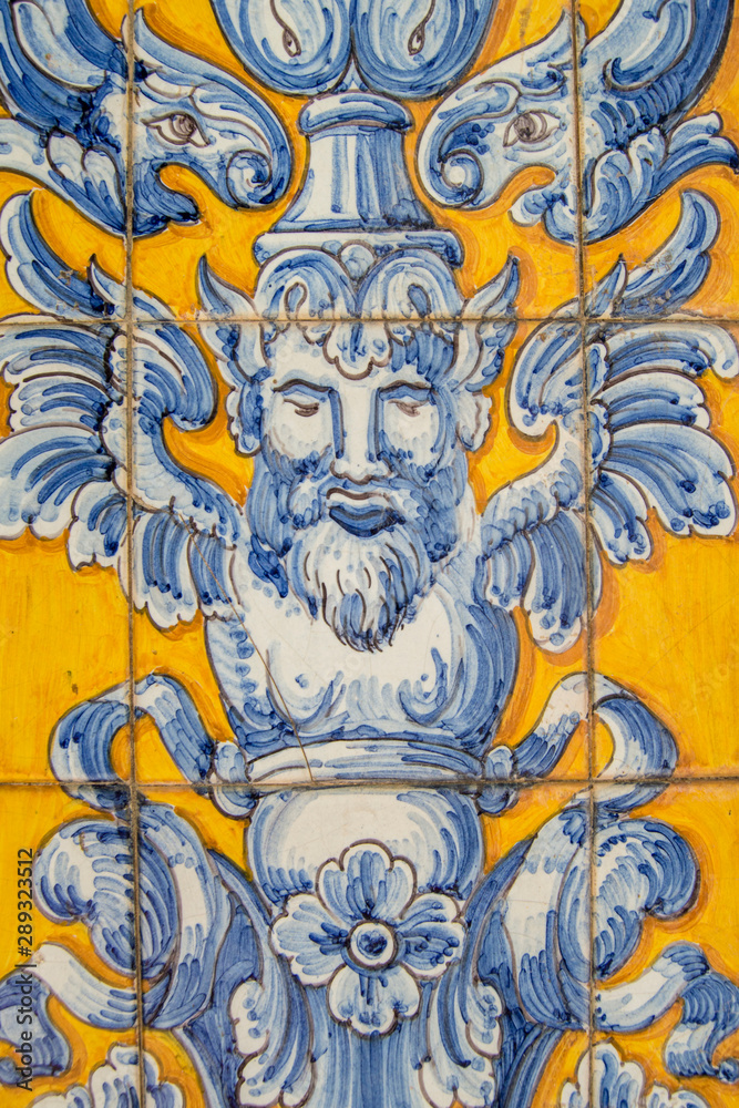 background with a fragment of ceramic tiles in yellow and blue from Talavera de la Reina, in Spain.