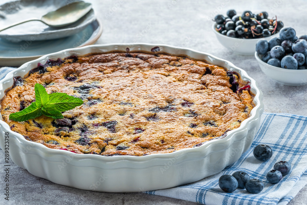 Lemon, blueberry and blackberry clafoutis - delicious baked fruit dessert