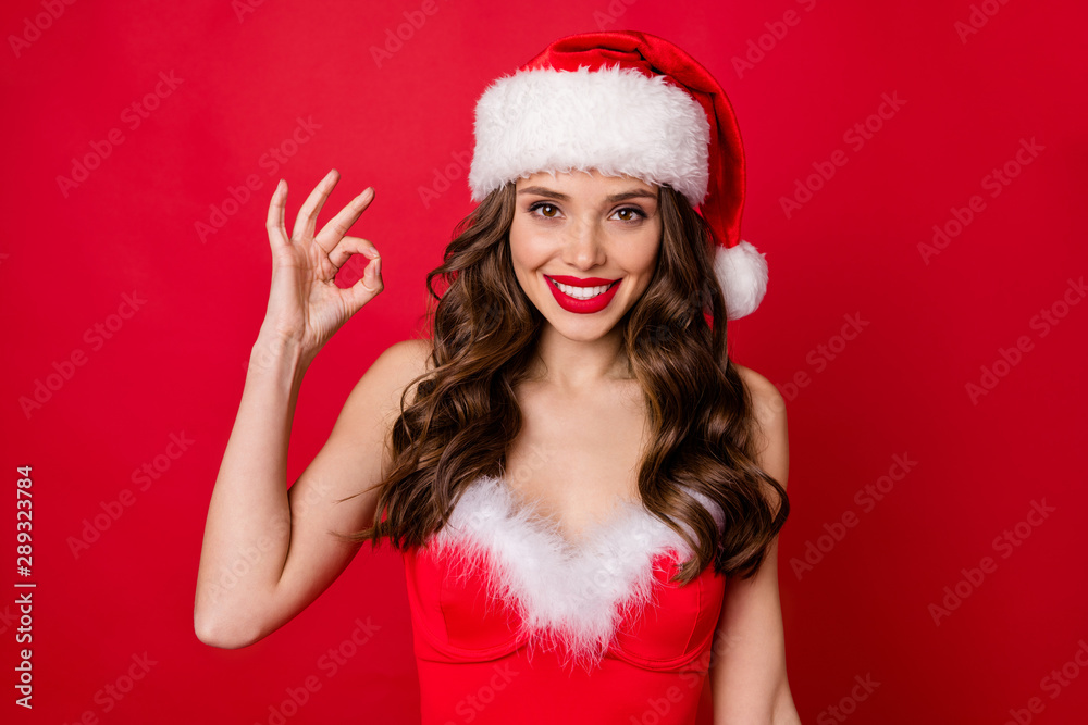 Portrait of lovely lady showing okay sign recommend event smiling wearing stylish skirt dress isolated over red background Portrait of lovely lady showing okay sign recommend event smiling wearing stylish skirt dress isolated over red background