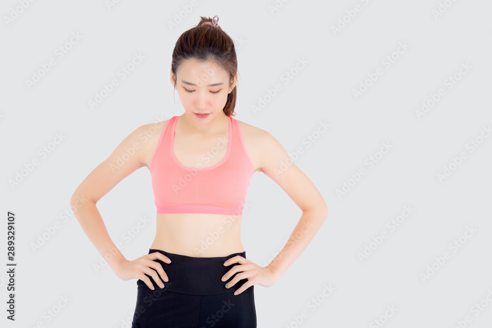 Beautiful portrait young asian woman in sport clothes with satisfied and confident isolated on white background, asia girl cheerful have shape and wellness, exercise for fit with health concept. Beautiful portrait young asian woman in sport clothes with satisfied and confident isolated on white background, asia girl cheerful have shape and wellness, exercise for fit with health concept.