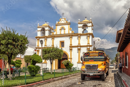 Chicken bus in front of Ermita de Santa Lucia, Antigua Guatemala, Guatemala