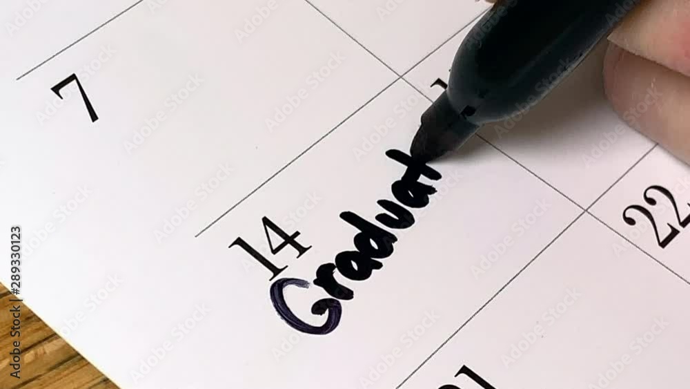 Graduation written in black marker on a calendar agenda page
