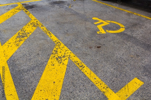 Painted disabled people parking sign
