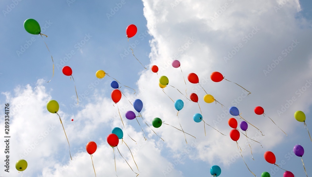 balloons fly into the sky with clouds in summer after the party balloons fly into the sky with clouds in summer after the party