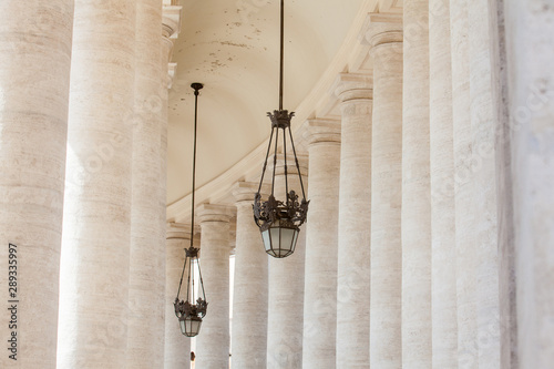 Detail of the beautirul Doric colonnade at St. Peter Square on the Vatican City in Rome