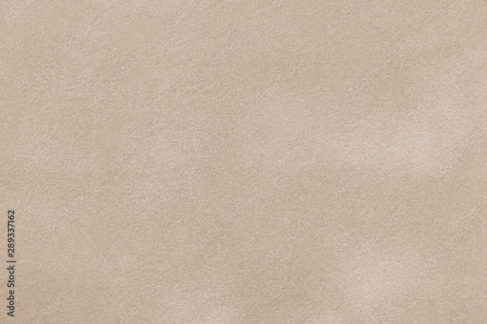 Light beige matte background of suede fabric, closeup. - obrazy, fototapety, plakaty 