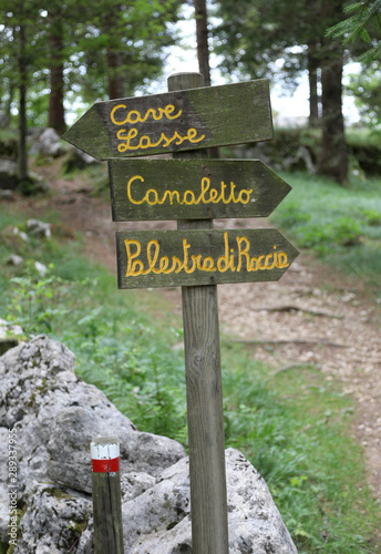 path signal in mountain track in Italy with the name of place photo