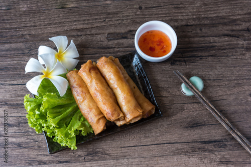 deep fried spring rolls, Por Pieer Tod or Fried spring rolls (Thai Spring Roll) Snacks and snacks that are popular with Thai and Chinese people. photo