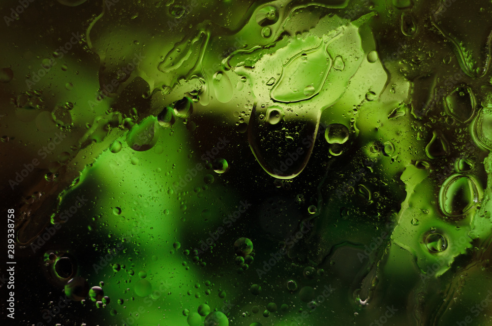 Beautiful liquid background. Background with different drops. Green and aqua elements. Beautiful liquid background. Background with different drops. Green and aqua elements.