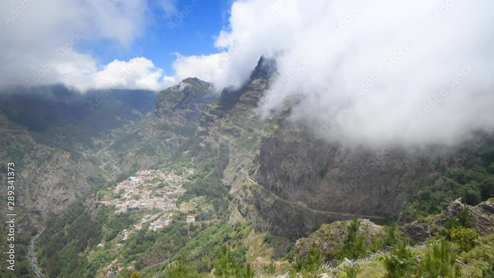 Clouds over the mountains on Madeira island at the Curral das Freiras or Valley of the Nuns Time-lapse clip. Clouds over the mountains on Madeira island at the Curral das Freiras or Valley of the Nuns Time-lapse clip.